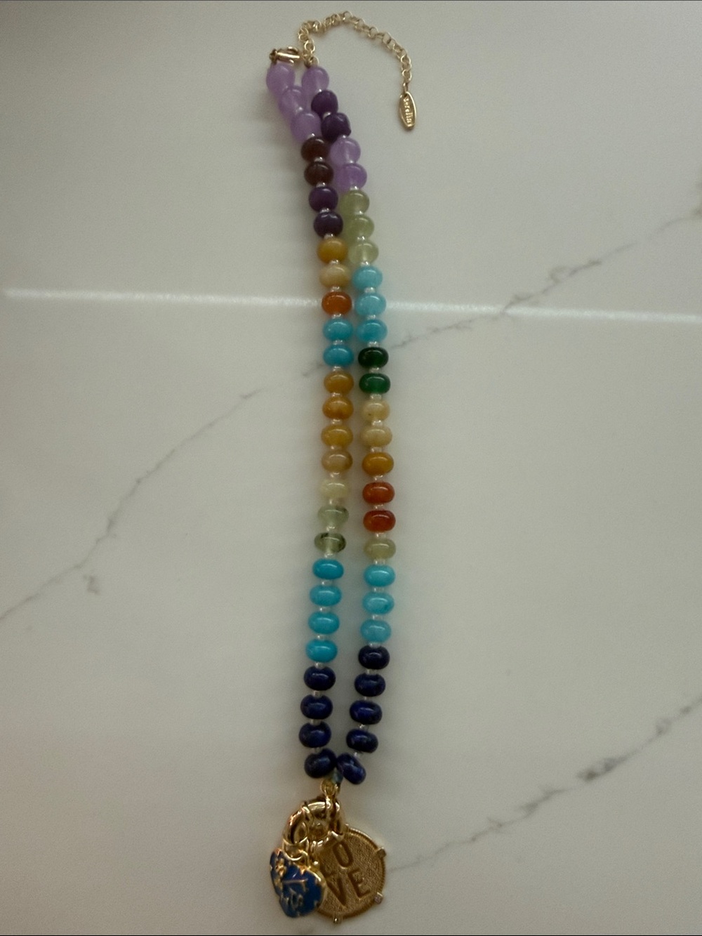 Anthropologie | beaded necklace with charms